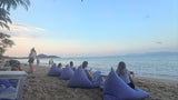 View from Wave in Fishermans Village, Koh Samui.  People on beanbags looking out to sea.